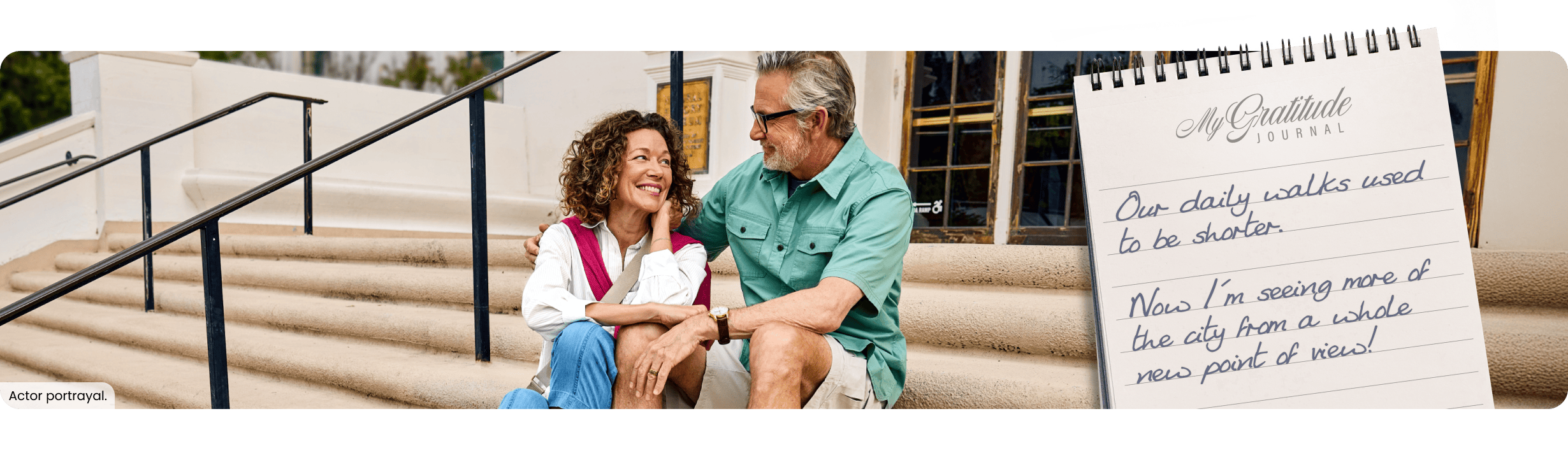 Couple sitting together on steps; My Gratitude Journal with the following entry: Our daily walks used to be shorter. Now I’m seeing more of the city from a whole new point of view!