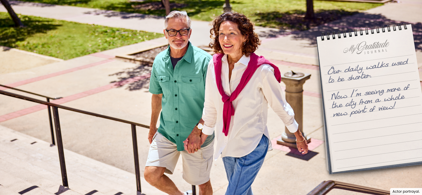 Couple walking up steps | My Gratitude Journal with the following entry: Our daily walks used to be shorter. Now I'm seeing more of the city from a whole new point of view!