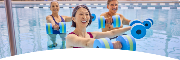 Two women talking in a swimming pool